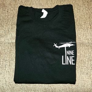 New woman's 9 Nine Line tee